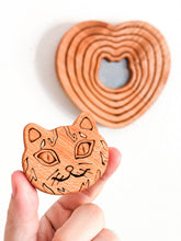 Regan Russell “In the Spirit of Kitty Affection”